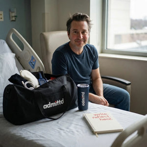 the duffle in a hospital room with the journal and tumbler